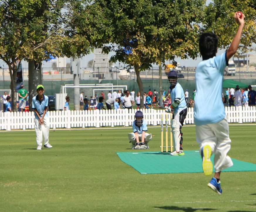 A junior cricket match on the oval at ICC Academy