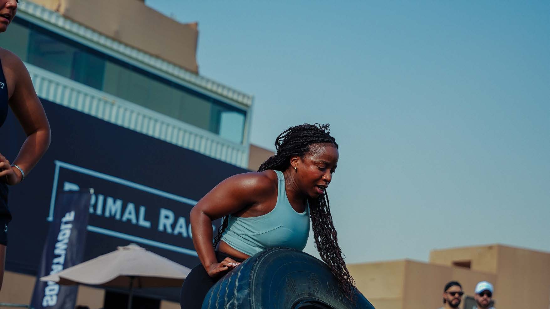 An athlete on the sandbag station at Primal Race