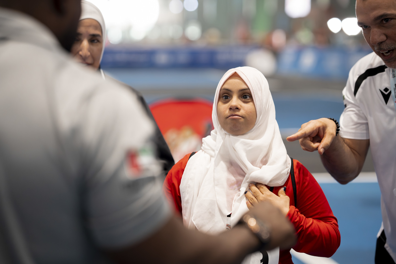 An athlete with coaches at the UAE Games 2026